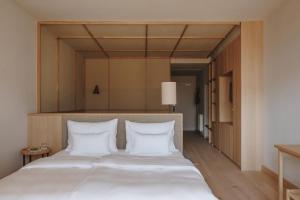 Postel nebo postele na pokoji v ubytování Hotel Schwarzschmied
