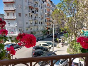 a balcony with a view of a parking lot with cars at Kabana Suite Thessaloniki in Thessaloniki