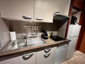 Kuchyňa alebo kuchynka v ubytovaní Superbe appartement 6 personnes Centre + 2 fotografie
