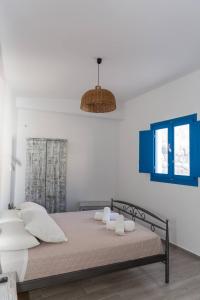 Santorita Suites客房内的一张或多张床位