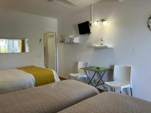 Posezení v ubytování Hôtel Punta e Mare des Chambres ou des Appartements T2