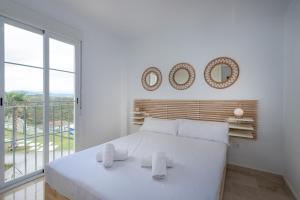 Postel nebo postele na pokoji v ubytování Small Oasis