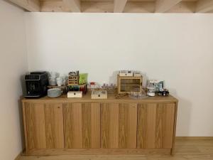 a wooden counter with various items on top of it at Borgo Cortivi b&b in Valdobbiadene