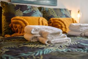 Letto o letti in una camera di Monolocale ombrellone incluso