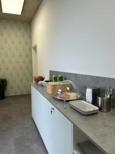 Kuchyňa alebo kuchynka v ubytovaní City Rooms Amstetten