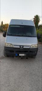 a white van parked in a parking lot at Casa movil in Santa Gertrudis de Fruitera