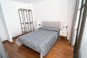 Postel nebo postele na pokoji v ubytování Ornis Apartments Poble