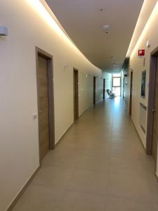 a corridor in a hospital with a hallway at San Giuseppe Casa per Ferie in Quercianella