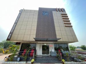 a building with a staircase in front of it at The Rhino in Guwahati