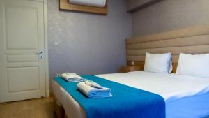 Bursa Suites Apart Otel客房内的一张或多张床位