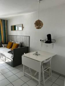 Χώρος καθιστικού στο Appartement "Chez Mag et Jo"