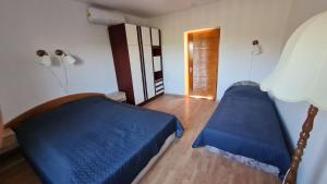 Postel nebo postele na pokoji v ubytování Sarudi vendégház + 37 fotografií
