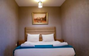 Bursa Suites Apart Otel客房内的一张或多张床位