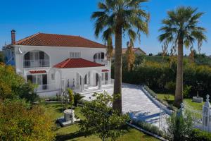 Zahrada ubytování Aigli Villa