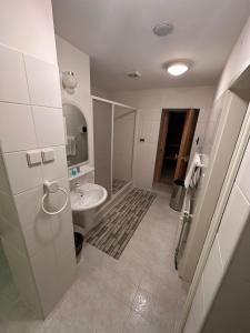 Koupelna v ubytování Hotel Radnice