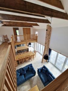 an overhead view of a living room and dining room at The Hayloft in Lincolnshire