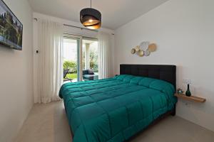 En eller flere senge i et værelse på VILLA JULIA - Regarda Travel