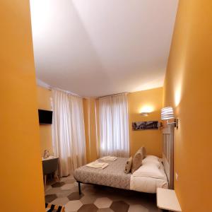 Postel nebo postele na pokoji v ubytování Residenza FillAnfi