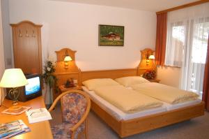 Łóżko lub łóżka w pokoju w obiekcie Hotel-Restaurant Burgblick