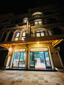 a store front of a building at night at Wins House - khách sạn in Phu Quoc