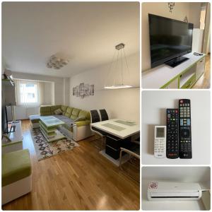 a living room with a couch a table and a television at Sarajevo Apartment in Sarajevo