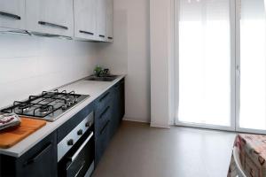 Kuchyň nebo kuchyňský kout v ubytování Appartamenti Gherbin Jesolo