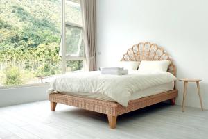 Кровать или кровати в номере 埔里-阮兜小丘