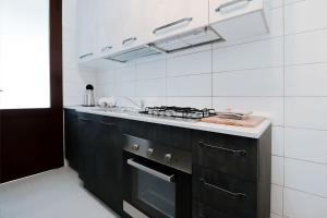 Kuchyň nebo kuchyňský kout v ubytování Appartamenti Gherbin Jesolo