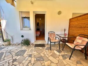 Patio alebo iná vonkajšia časť ubytovania Apartmani Zeleni Raj