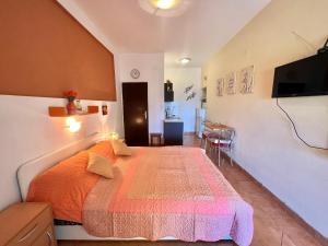 Posteľ alebo postele v izbe v ubytovaní Apartmani Zeleni Raj
