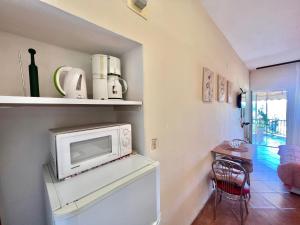 Kuchyňa alebo kuchynka v ubytovaní Apartmani Zeleni Raj