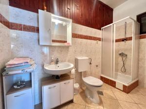 Kúpeľňa v ubytovaní Apartmani Zeleni Raj