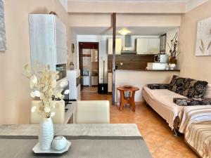Posteľ alebo postele v izbe v ubytovaní Apartmani Zeleni Raj