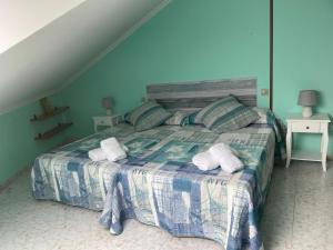 Postel nebo postele na pokoji v ubytování Apartamento con hermosas vistas a la playa del Altar