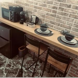 Kuchyň nebo kuchyňský kout v ubytování The loft 27