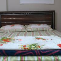 A bed or beds in a room at Nemrut Dağı Işik Pansi̇on