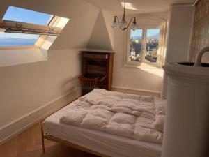 Postel nebo postele na pokoji v ubytování Appartement de charme vue splendide