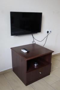 TV a/nebo společenská místnost v ubytování Glistar Hotel