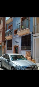 a silver car parked in front of a building at Mar Menor in San Pedro del Pinatar