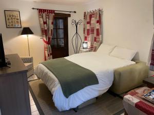 Posteľ alebo postele v izbe v ubytovaní Le Douet Fleury - Chambre d'Hôtes et Gîtes
