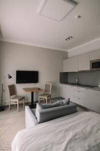 Kuchyň nebo kuchyňský kout v ubytování Merepargi ApartHotel & Cafe