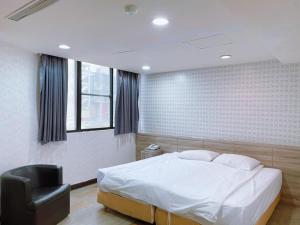 Postelja oz. postelje v sobi nastanitve A22 Wei Lu Hotel