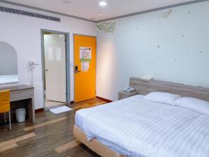 Postelja oz. postelje v sobi nastanitve A22 Wei Lu Hotel