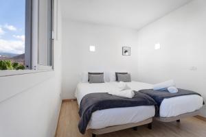 Postel nebo postele na pokoji v ubytování Bonito Apartamento Cristian Playa
