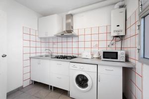 Kuchyň nebo kuchyňský kout v ubytování Bonito Apartamento Cristian Playa