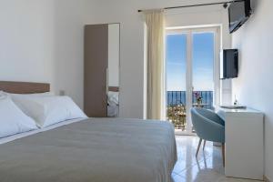 Cama ou camas em um quarto em Albergo La Prora