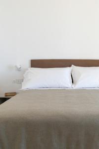 Cama ou camas em um quarto em Albergo La Prora