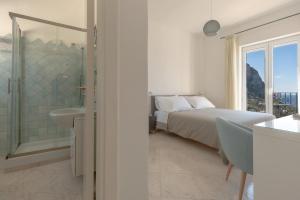 Cama ou camas em um quarto em Albergo La Prora