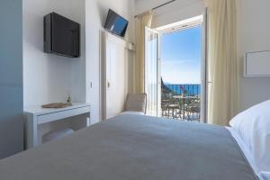 Cama ou camas em um quarto em Albergo La Prora