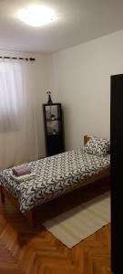 Posteľ alebo postele v izbe v ubytovaní Apartments Valiza III Large apartment - 3 bedrooms and parking space i Apartments Valiza IV